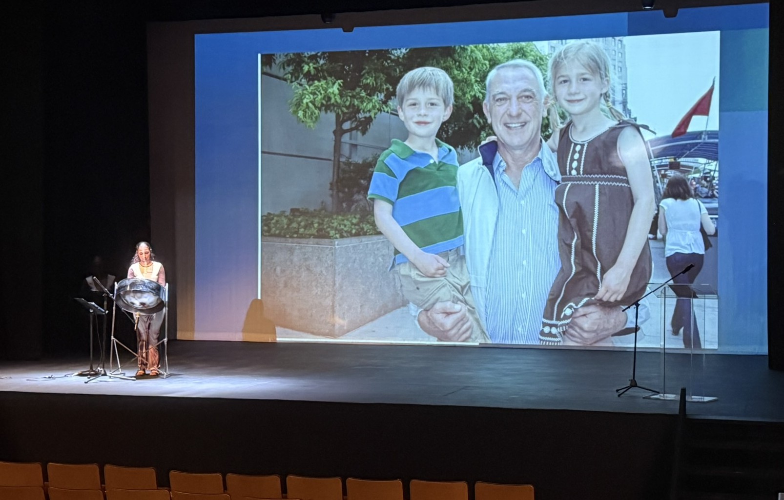 The event, held at the Harquail Theatre, had live steel pan music playing to photos of Bould's life