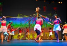 The Cayman-style Nutcracker brings the classic tale home The Cayman-style part of The Nutcracker performance was evident from the start with dancing around the maypole. - Photo: Christopher Tobutt