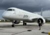 Porter Airlines touches down for the first time in Cayman Porter Airlines plane at ORIA