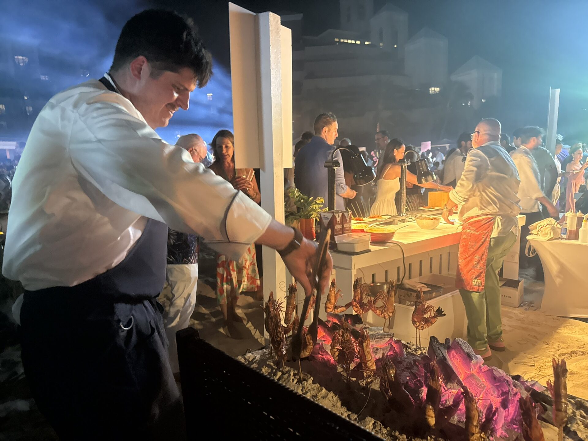 Prawns being prepared at the Barefoot BBQ event on Seven Mile Beach
