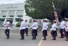 Police service looks to boost numbers with recruitment drive Police parade outside Parliament