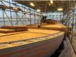 Shipwrights scout site on Cayman to finish rebuilding historic schooner