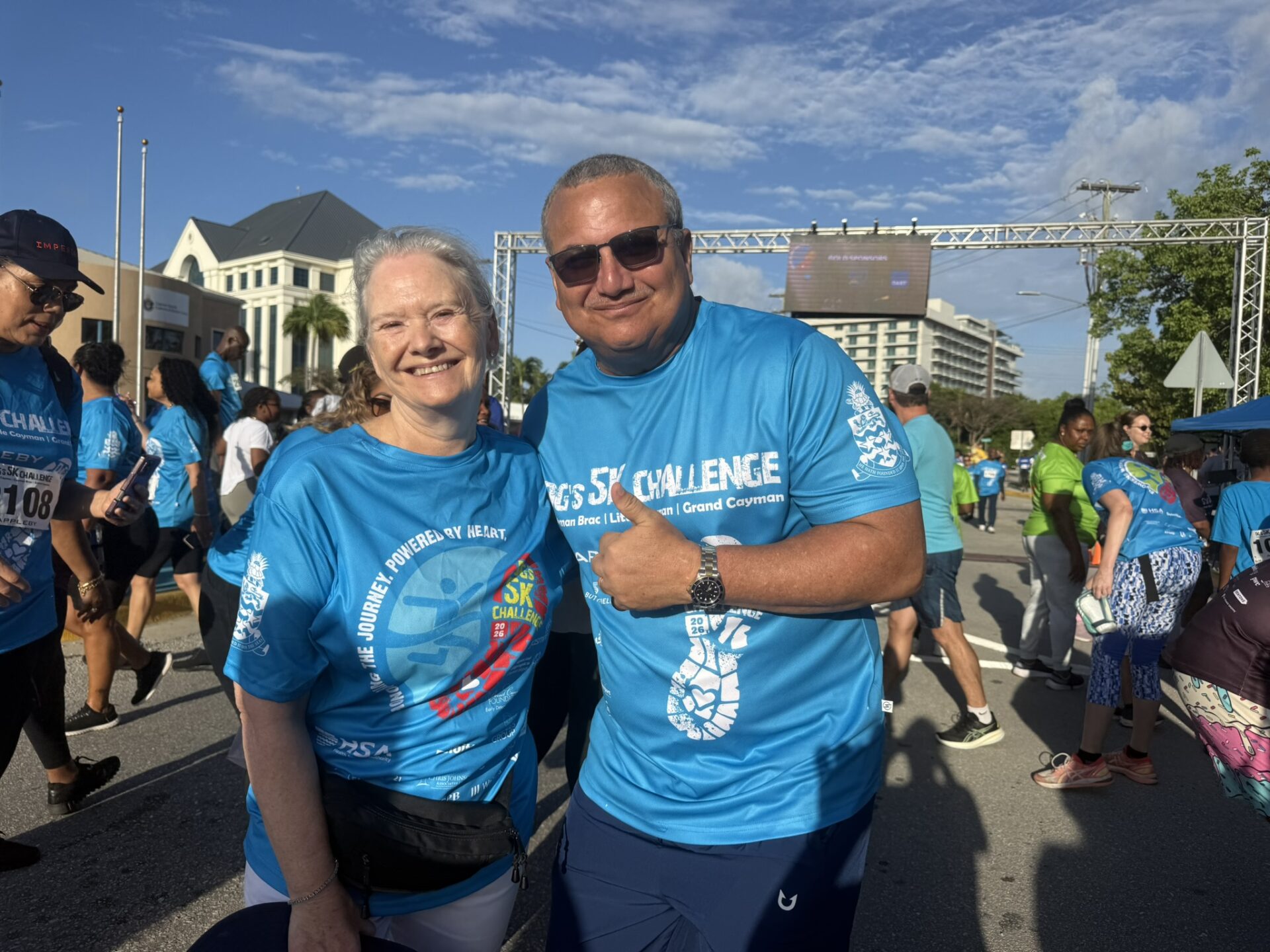 Deputy governor Franz Manderson celebrating after the race with governor Jane Owen