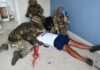 Cayman’s regiment prepares with disaster training A Cayman Islands Regiment medic team treat a hurricane 'casualty'. - Photo: Raymond Hainey