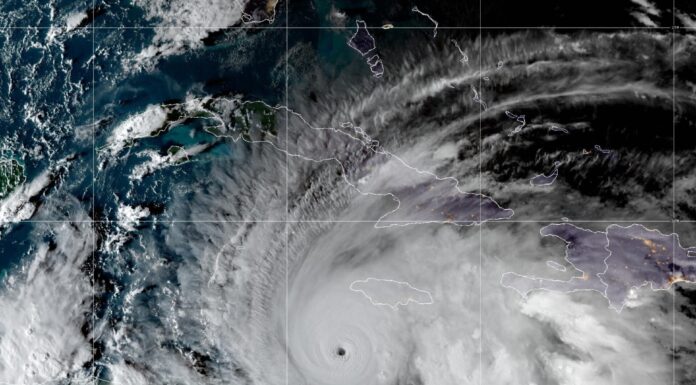 NOAA declares El Niño as forecasters downgrade hurricane outlook