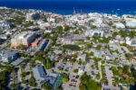Report: Cayman profited from population growth but failed to plan for its cost