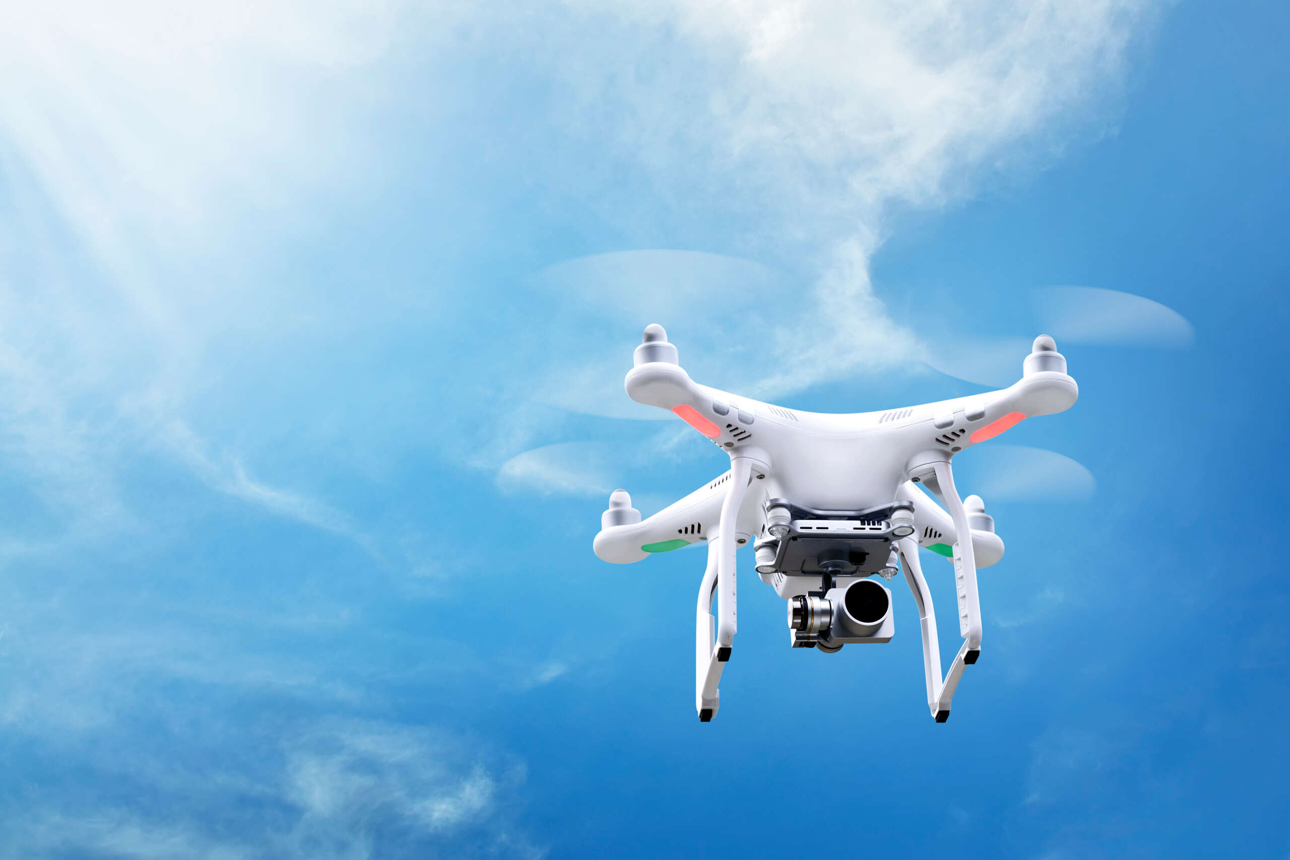 Small white drone hover